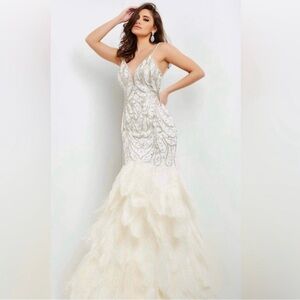 Jovani 04625 off-white floor length dress with mermaid feather bottom.